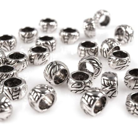 Galanterie: Kovový korálek 6x10 mm (1ks)
